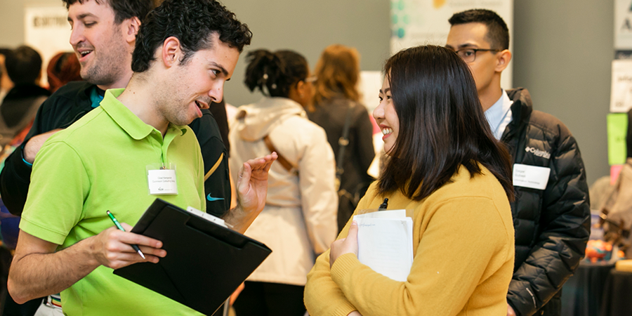 Students meet with employers at Mason's Career Fair